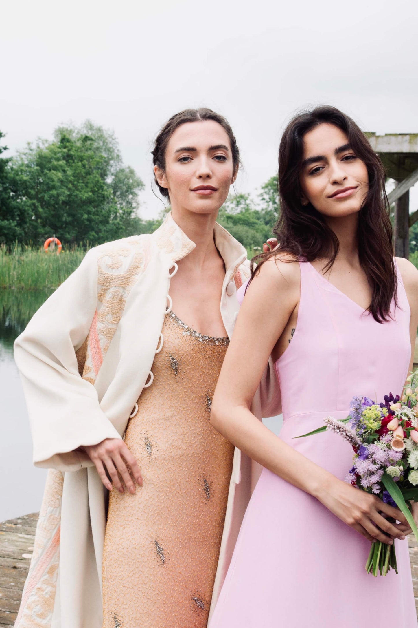 Salmon embroidered wedding gown and jacket and pink bridesmaid dress