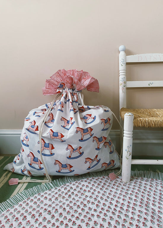 Load image into Gallery viewer, Blue / Pink Rocking Horse Sack
